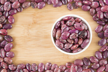 Pinto beans in the bowl. (Phaseolus vulgaris)