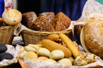 The bread is on the counter in the store. It is very fresh.