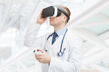 Indoors close up shot of male doctor wearing VR glasses