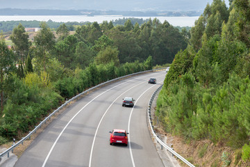 view of the turn of the highway between the mountains