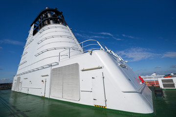 Ship chimney on upper deck of cruise ship