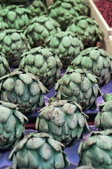 Fototapeta na wymiar Beautiful fresh artichokes on sale