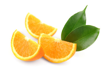 Orange fruit slices with leaves, isolated on white