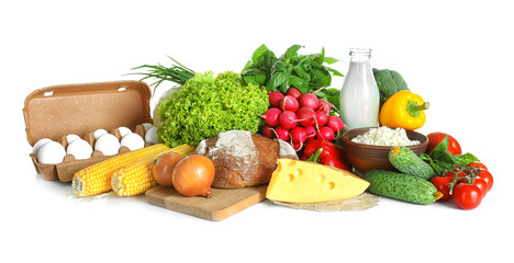 Vegetables and dairy products isolated on white
