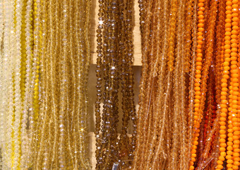 Orange necklaces made for sale in jewelry shop