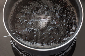 Boiling red beans at pan