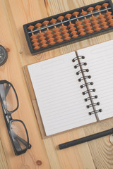 Spiral notebook on wood background