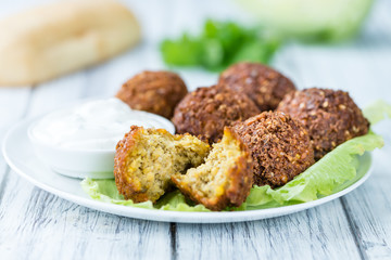Wooden table with Falafels