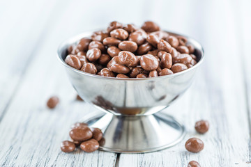 Old wooden table with Chocolate Raisins