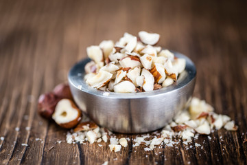 Hazelnuts (chopped, selective focus)