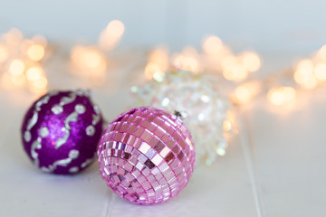 Pink, purple and white Christmas decorations with lights 