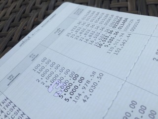 Obraz premium Zbliżenie na oszczędności na koncie Passbook