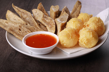 keropok lekor isolated on wooden background