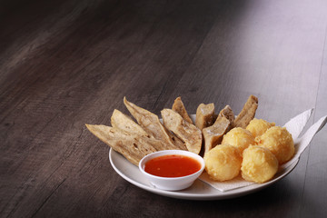 keropok lekor isolated on wooden background