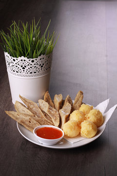 keropok lekor isolated on wooden background