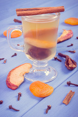 Vintage photo, Fresh compote of dried fruits, ingredients and spices on boards
