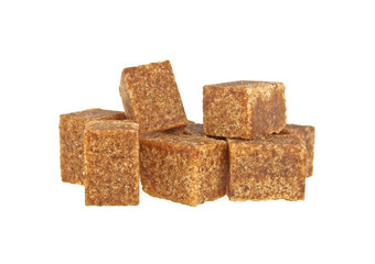 Brown sugar cubes on a white background