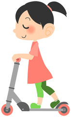 キックボードで滑る女の子