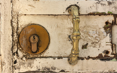 Vintage handle and lock, closed door