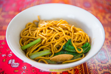 yellow noodles stir-fried with vegetable