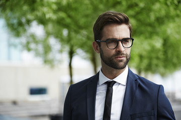 Smart dressed man in glasses