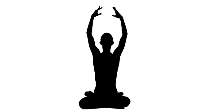 Silhouette woman meditating in a yoga pose. White background. Silhouette