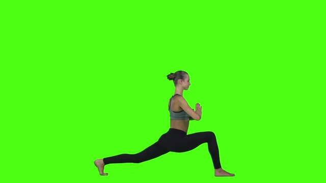Woman do yoga. Green screen. Slow motion