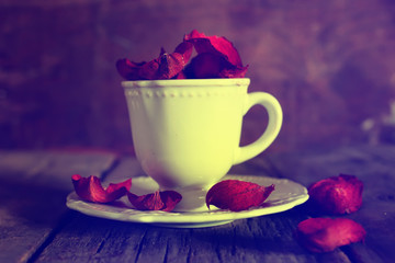 toned photo tea cup with sugar cubes