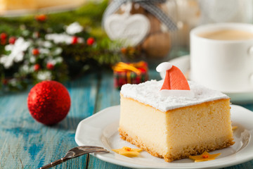 Delicious, traditional cheesecake. Christmas decoration.