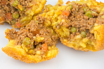 Arancini, sicilian rice balls stuffed with meat and peas