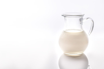 A jug of milk on the white background