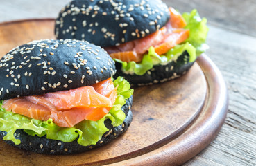 Black sandwich with salmon