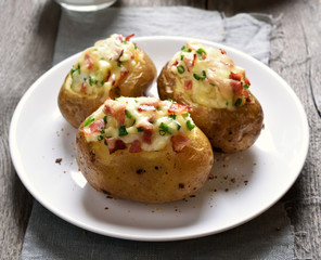 Baked potato with bacon and cheese