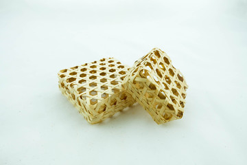 Handmade wicker boxes. White background.