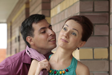 Beautiful couple outdoors in a summer day