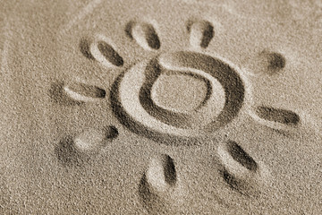 Fototapeta na wymiar Sun in the sand, sunbathing