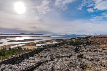 panoramic view of thingvellir national park at wintertime and back lighted photo, iceland