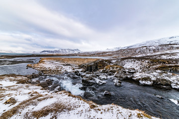 waterfall kirkjufellsfoss at wintertime, iceland