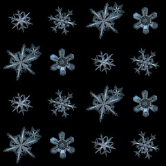 Snowflakes isolated on black background. This is collection of real snowflake macro photos (large...