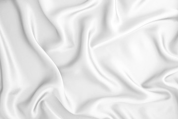 Close up wave  luxury white silk or satin fabric background