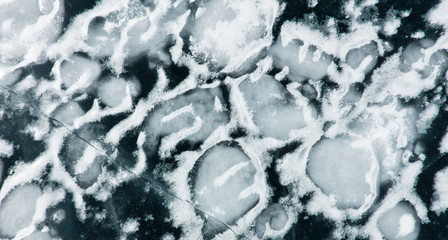 The pattern of cracks on the blue ice of Lake Baikal