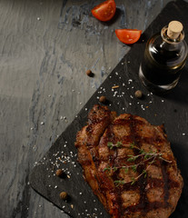 Tasty juicy stake against a dark background
