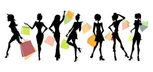 Shopping sillhouettes set. Black sillhouettes of women with colorful shopping bags on white background. Elegant, young and slim women.