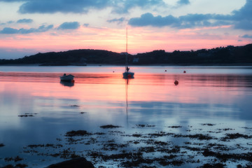 Tresco sunset looking towards bryher in cornwall england uk
