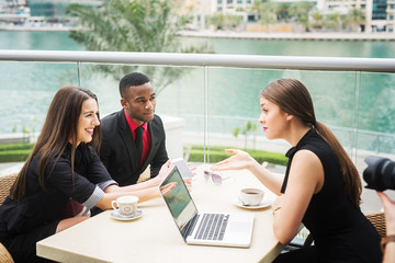 Business people in a cafe.
