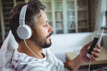 Man listening to music on headphones