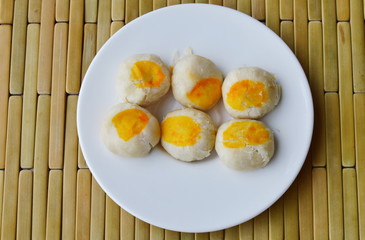Chinese cake filling sweet bean and salty egg yolk on dish