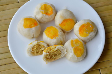 Chinese pastry filling sweet bean and salty egg yolk on dish