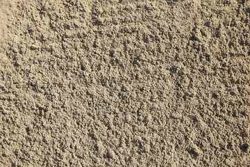 A full page of sandy beach background texture