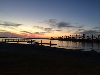 California sunset with clouds on the sea. Mission Bay in San Diego